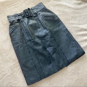 Vintage 90s black leather skirt with belt buckle detail